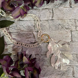White Tortoise Palm Tree Leaf Pendant Necklace by ZENZII