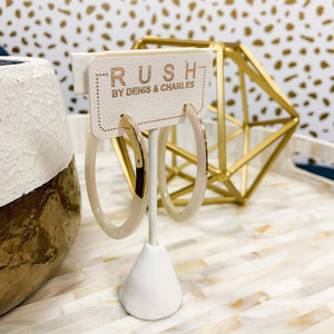 Off-White Resin Oval Hoop Earrings by RUSH by Denis & Charles